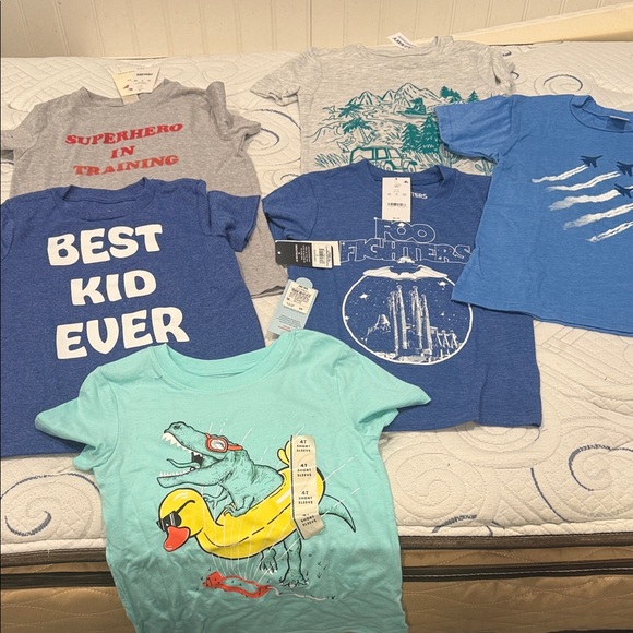 Old Navy Other - Lot of 4T
graphic tees all brand new